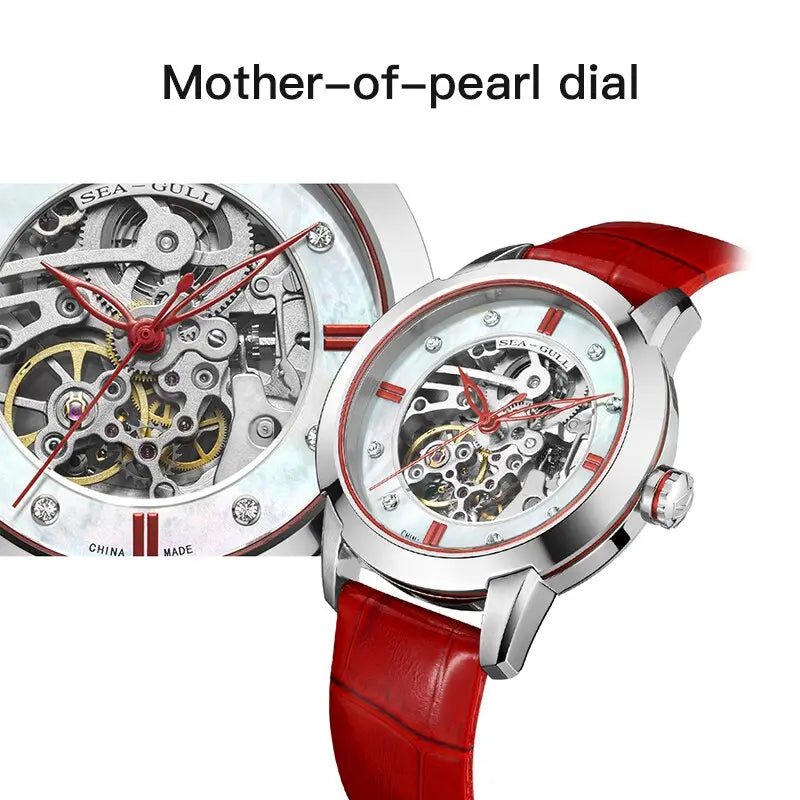Elegant Uhr mit Perlmuttzifferblatt, rotem Armband und sichtbarem mechanischem Uhrwerk