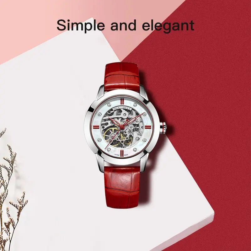 Elegantet Skelettuhr mit rotem Lederarmband und sichtbarem mechanischem Uhrwerk