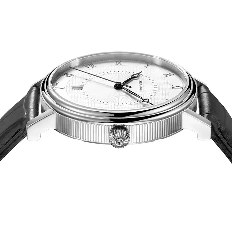 Elegant wristwatch with Roman numerals, sunburst dial, and textured bezel on black leather strap